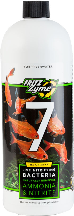 Front view of a white bottle with black cap labeled "Fritz Zyme 7" showing orange fish and text about live nitrifying bacteria.