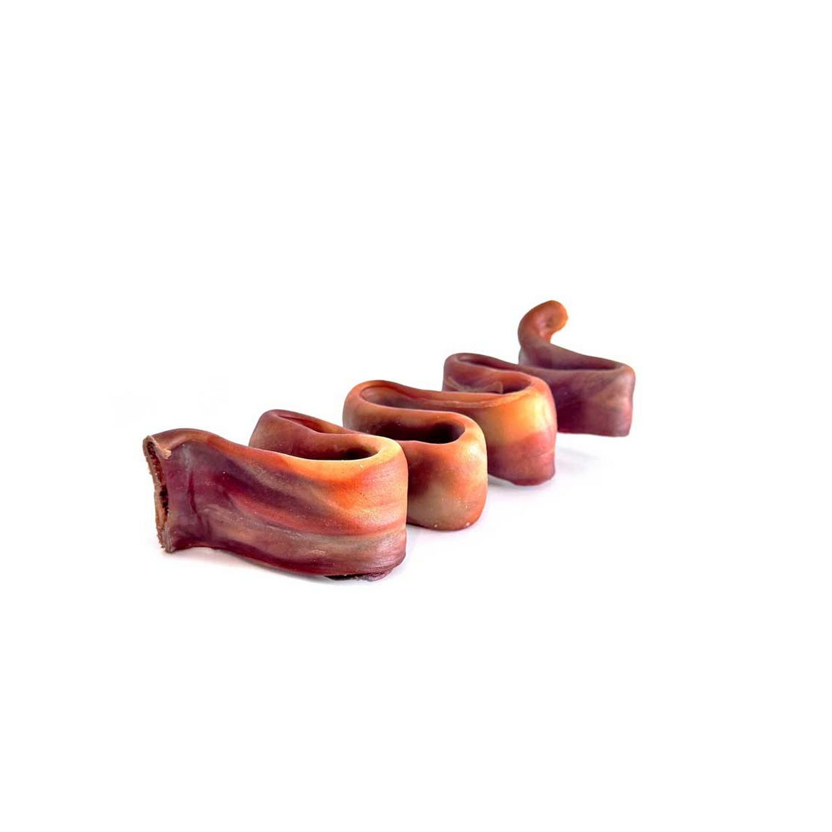 Close-up of four reddish-brown wavy beef collagen puzzle pieces in a row on white background