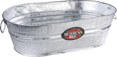Close-up of a Behrens brand hot dipped steel oval tub with metal handles and a label.