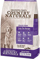 Front view of Grandma Mae's Country Naturals grain-free low fat pork dog food package, purple and beige.