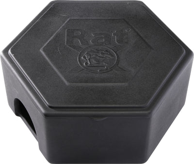 Close-up of a black Ratx bait station with embossed logo and a side slot.