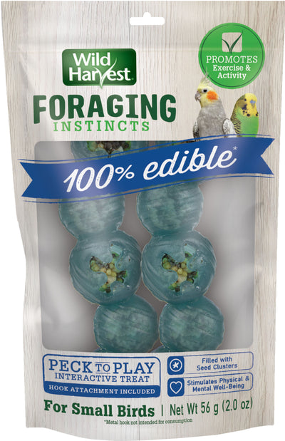 Packaged Wild Harvest Foraging Instincts bird treat with blue edible beads and seed clusters visible through clear plastic.