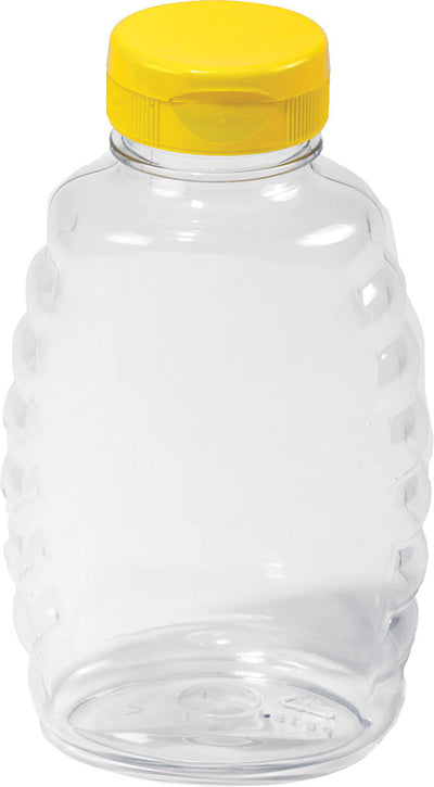 Clear plastic honey jar with yellow lid, front view, packaged product