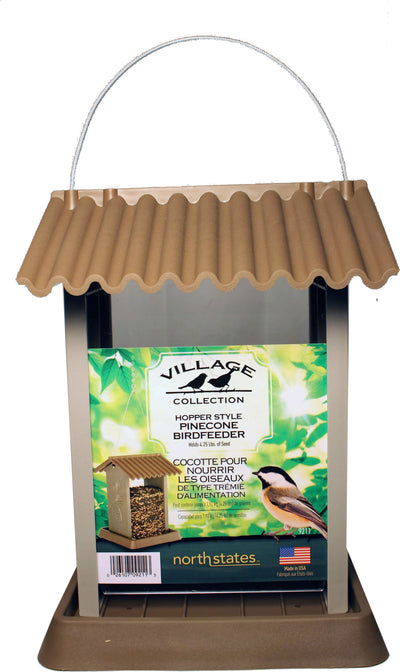 Front view of a brown Village Collection hopper-style pinecone bird feeder with a roof and handle.