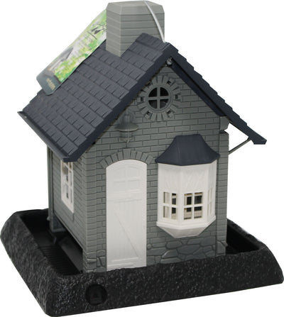Gray and blue Village Collection Bayside Cottage bird feeder with a black base, shown front view in packaging.