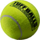 Close-up of a yellow Tuff Balls industrial strength dog toy with gray stripe.