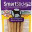 Packaged SmartSticks dog chews with 10 sticks, bacon and cheese flavor, purple and yellow packaging.