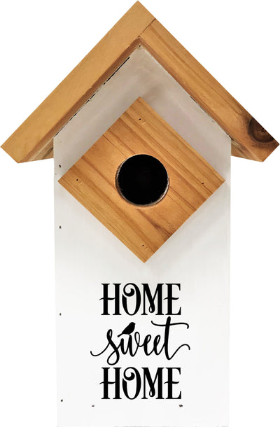 Front view of a white farmhouse-style birdhouse with wooden roof and 'HOME sweet HOME' text.