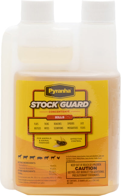 Front view of a white plastic bottle with a yellow label for Pyranha Stock Guard Concentrate.