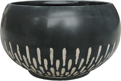 Close-up of a brown ceramic planter with white vertical accents, front view.