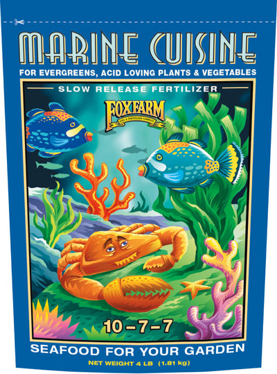 Front view of a blue packaged product labeled Marine Cuisine Slow Release Fertilizer with 10-7-7 and seafood-themed illustration.