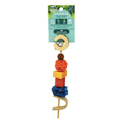 Oxbow Enriched Life Color Kabob toy with wooden hook, orange ball, wooden cube, red block, blue fabric, and spiral base on a card.