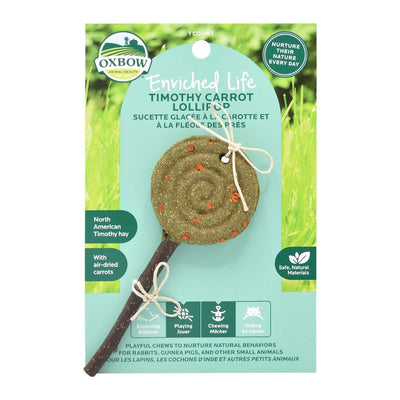 Packaged Oxbow Enriched Life Timothy Carrot Lollipop with North American timothy hay and air-dried carrots on a light blue card.