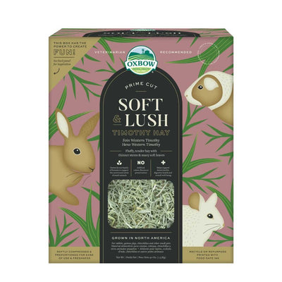 Front view of Oxbow Prime Cut Soft Lush Timothy Hay 40 oz package with pink background and animal illustrations.
