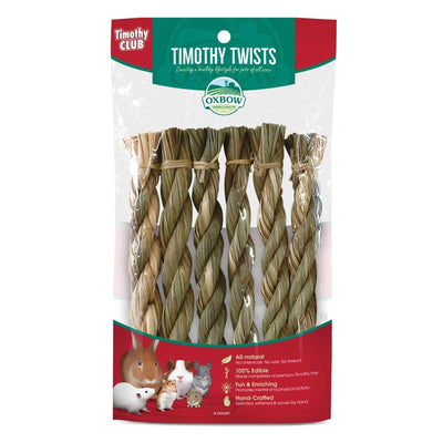 Packaged Oxbow Timothy Twists product with six braided hay twists visible through clear plastic packaging.