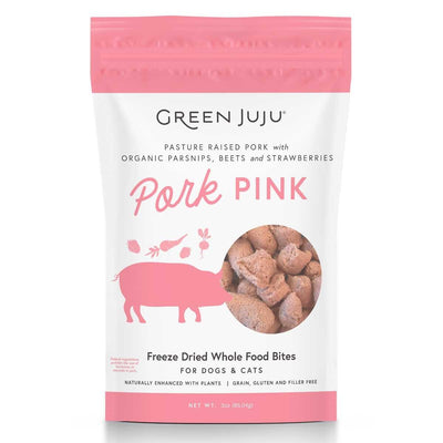 Front view of a pink and white packaged product labeled Green Juju Pork Pink Freeze Dried Whole Food Bites for dogs and cats.