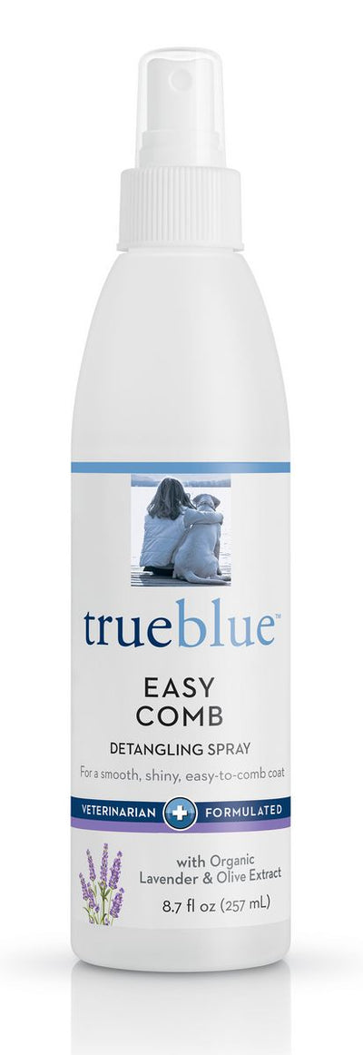 Front view of a white Trueblue Easy Comb Detangling Spray bottle with blue accents and lavender illustration.