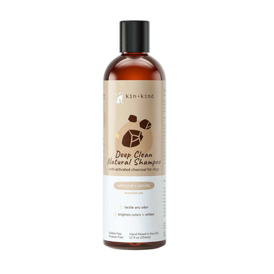 Front view of a Kin + Kind Deep Clean Natural Shampoo bottle with almond + vanilla essential oils, 12 fl oz.