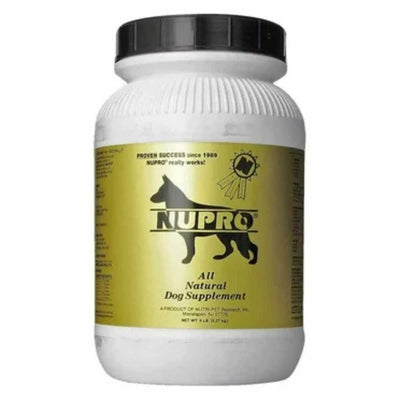 Front view of a white Nupro All Natural Dog Supplement jar with a yellow label and black cap.