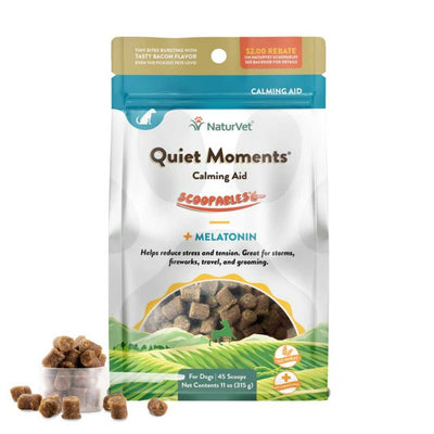 Front view of a packaged product: NaturVet Scoopables Quiet Moments Calming Aid for dogs, 11 oz bag with bacon-flavored treats.