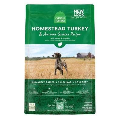 Front view of Open Farm dog food package showing Homestead Turkey & Ancient Grains Recipe in green and white packaging.