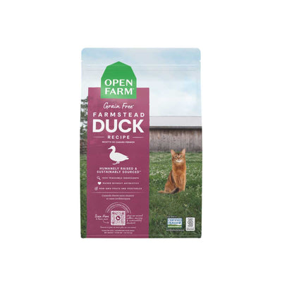 Front view of Open Farm Farmstead Grain Free Duck Recipe dry cat food bag, 8lb, purple and green packaging with cat image.