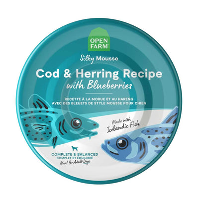 Front view of Open Farm Silky Mousse Cod & Herring Recipe with Blueberries dog food can, teal and white packaging with fish illustrations.
