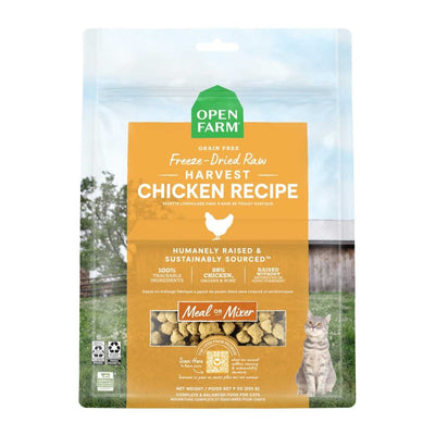 Front view of Open Farm cat food package showing freeze-dried raw chicken recipe in orange and green packaging.