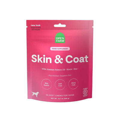 Front view of a pink Open Farm dog food supplement package labeled Skin & Coat with 90 soft chews.