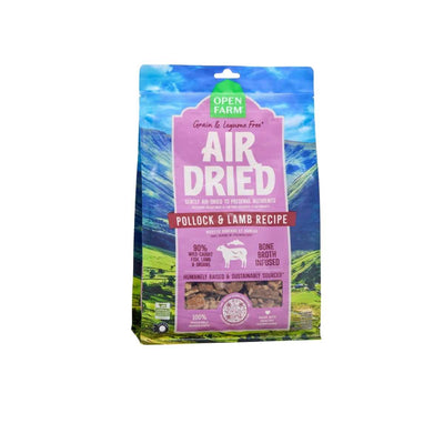 Front view of Open Farm Air Dried Pollock & Lamb Recipe dog food in a 16 oz bag with pink label and green top.