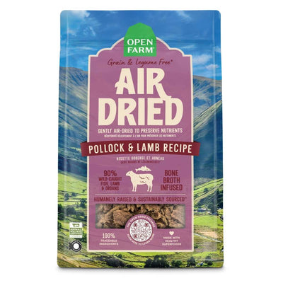 Front view of Open Farm dog food package for Air Dried Pollock & Lamb Recipe, 2 lb, purple and green packaging with mountain background.
