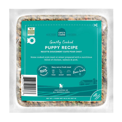 Front view of Open Farm Dog Frozen Gently Cooked Puppy Recipe pouch, 8 oz, teal label with chicken, salmon, and pork.