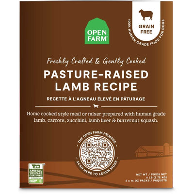 Front view of Open Farm dog food package with brown background, green logo, and text describing pasture-raised lamb recipe.