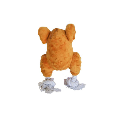 Back view of an orange plush turkey toy with white yarn feet, showing a stuffed animal product.