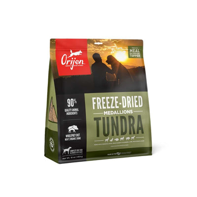 Front view of Orijen Freeze-Dried Medallions Tundra dog food package, 16 oz, green and red packaging.