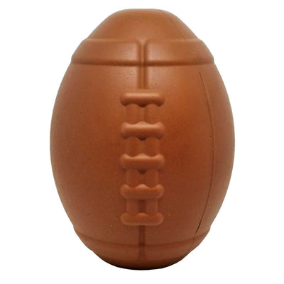 Close-up of a brown, large football-shaped chocolate candy with visible laces.