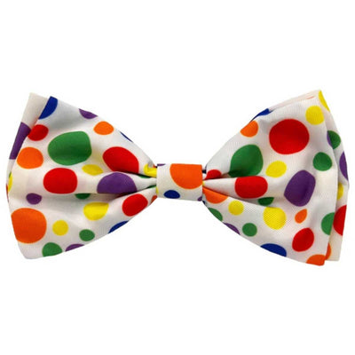 Close-up of a colorful polka dot bow tie with red, green, yellow, orange, and purple dots on white fabric.