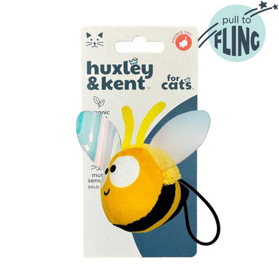 Packaged Huxley & Kent cat toy: yellow bumble bee plush with clear wings and black string.