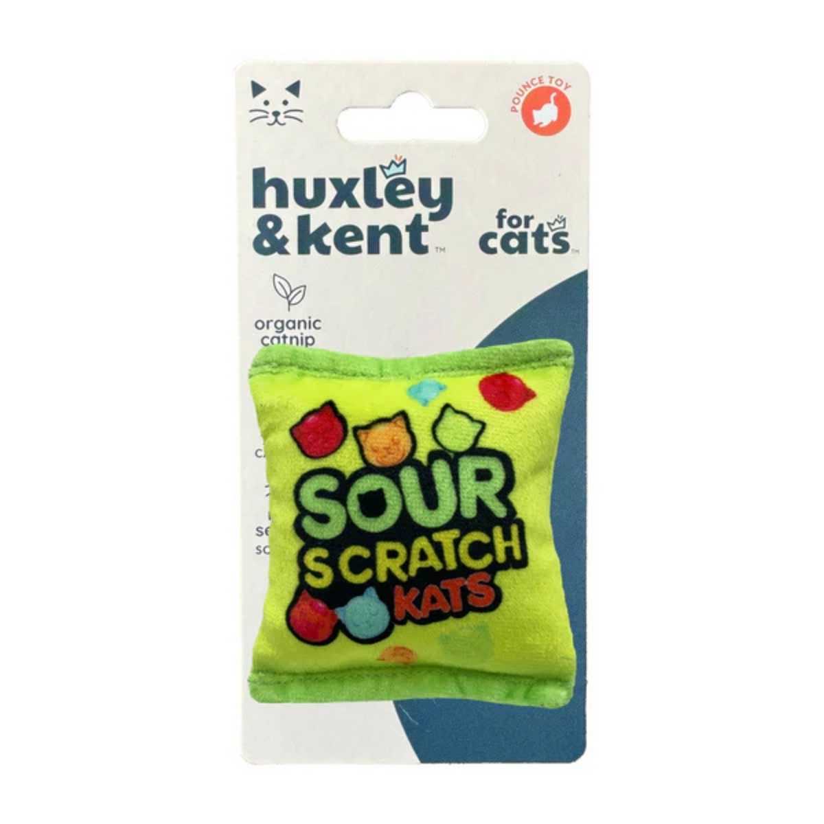 Packaged Huxley & Kent Sour Scratch Kats cat toy with green fabric and colorful cat-themed design