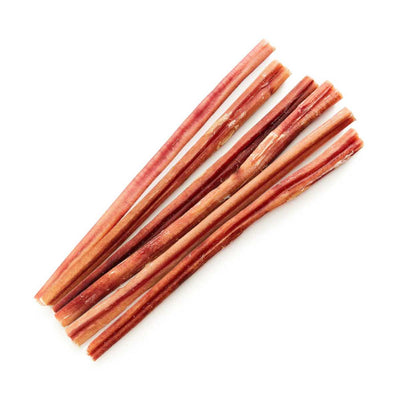 Close-up of six reddish-brown bully sticks arranged diagonally on white background