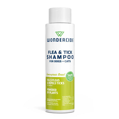 Front view of a white and green packaged product labeled Wondercide Flea & Tick Shampoo for Dogs + Cats with Lemongrass Scent.