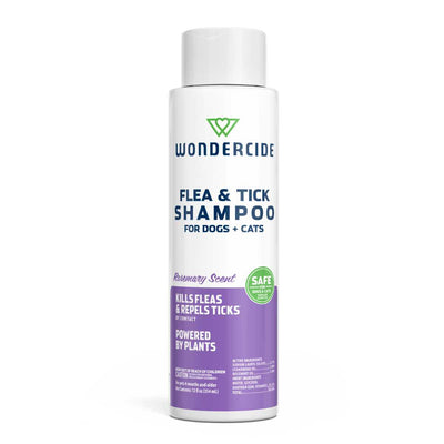 Front view of Wondercide flea and tick shampoo for dogs and cats with rosemary scent in a white and purple bottle.