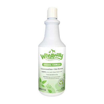 Front view of a white Wee Away bottle with green label showing 'Original Formula Concentrated Stain + Odor Remover' and 'Green Tea' flavor.