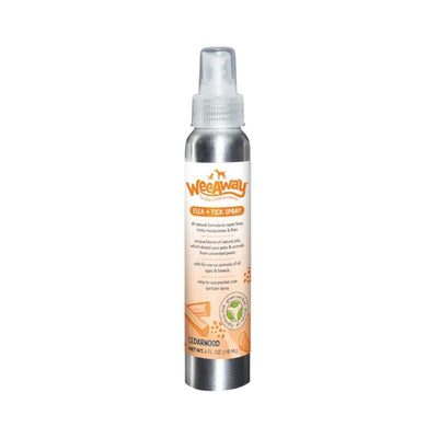 Front view of a silver Wee Away Flea + Tick Spray bottle with orange label and cedarwood scent, 4 fl oz.