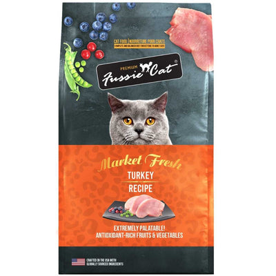 Front view of a packaged Fussie Cat Market Fresh Turkey Recipe cat food bag with a gray cat and food ingredients.
