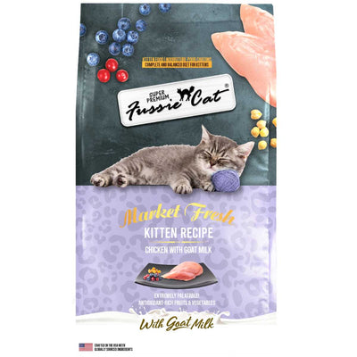 Front view of a packaged Fussie Cat kitten food bag with a sleeping kitten, blueberries, and chicken.