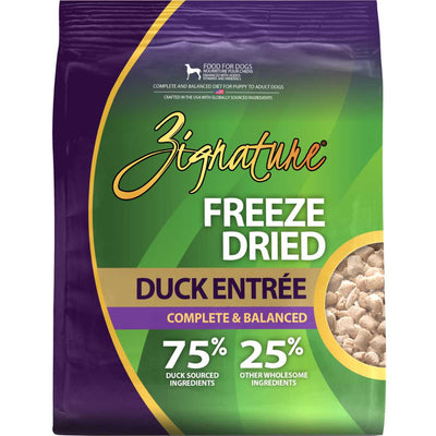 Front view of a Zignature Freeze Dried Duck Entrée dog food package with purple and green colors.
