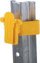 Close-up of a yellow plastic tape insulator attached to a silver metal post.