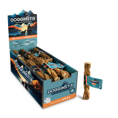 Open retail display box of Dogginstix natural dog chews with braided beef tripe treats, one single treat shown outside the box.