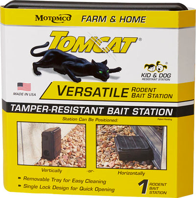 Packaged Tomcat Versatile Rodent Bait Station, black, front view showing product box with cat illustration and positioning options.